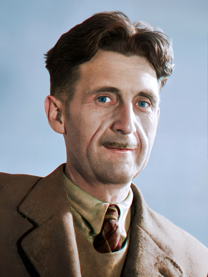 Colourised portrait of George Orwell, circa 1940. He wears a suit and tie, with a calm expression and clear gaze toward the camera.