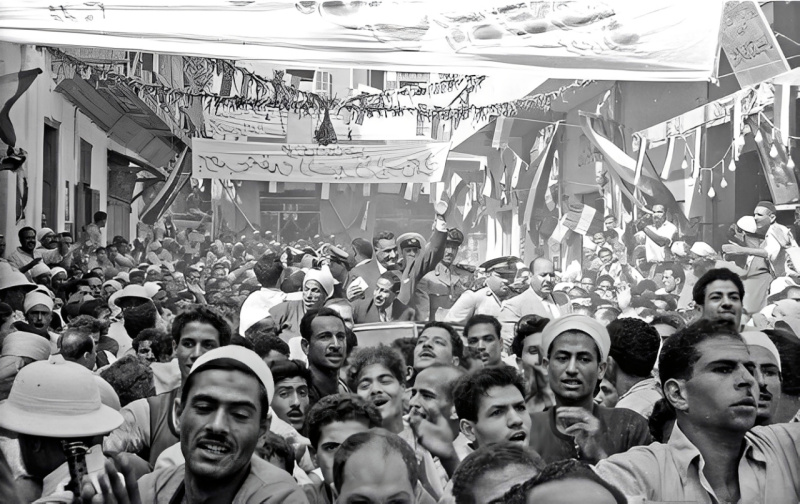 President Gamal Abdel Nasser greeting crowds in the town of Rashid before attending a military parade